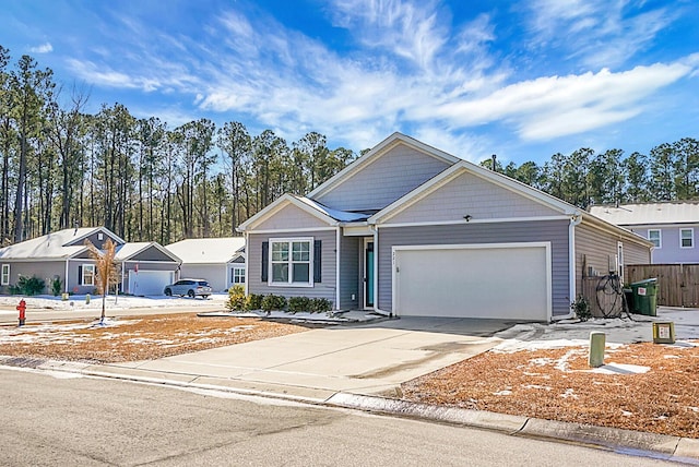 view of front of property with a garage