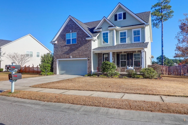 view of front of house featuring a garage and covered porch