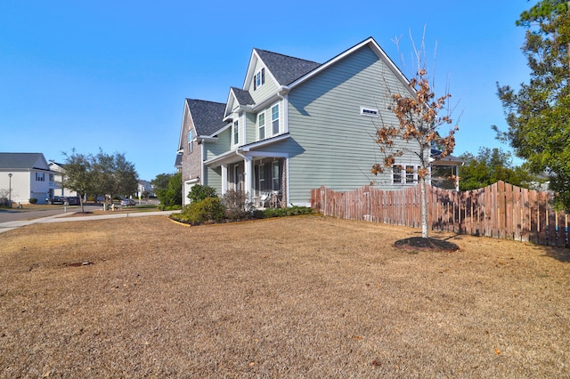 view of property exterior featuring a yard