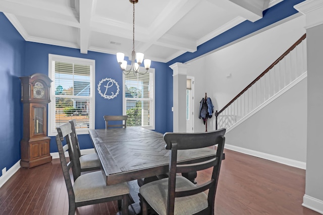 dining area featuring ornate columns, a chandelier, dark hardwood / wood-style flooring, and beam ceiling