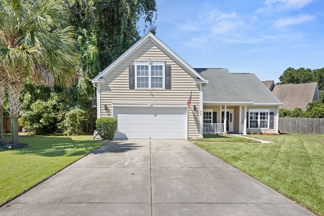 view of front facade featuring a front yard, covered porch, and a garage