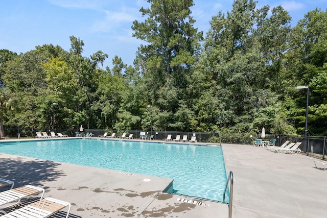 view of pool featuring a patio area