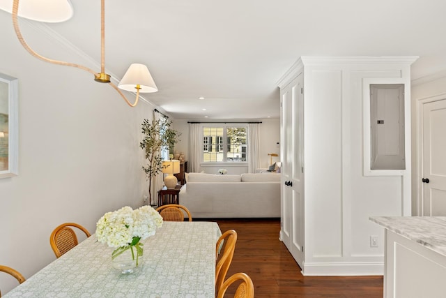 5 Smith St, Charleston, SC 29401 - dining space with electric panel, dark wood-style flooring, crown molding, and recessed lighting