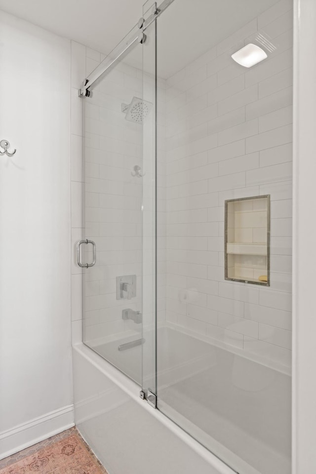 5 Smith St, Charleston, SC 29401 - bathroom featuring shower / bath combination with glass door and baseboards
