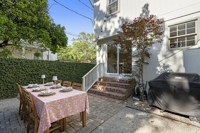 5 Smith St, Charleston, SC 29401 - view of patio / terrace with grilling area, outdoor dining area, and fence
