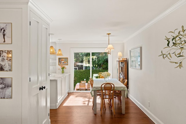 5 Smith St, Charleston, SC 29401 - dining space featuring wood finished floors, baseboards, and ornamental molding