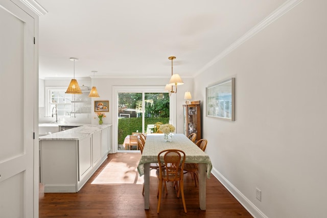 5 Smith St, Charleston, SC 29401 - dining area featuring crown molding, wood finished floors, and baseboards