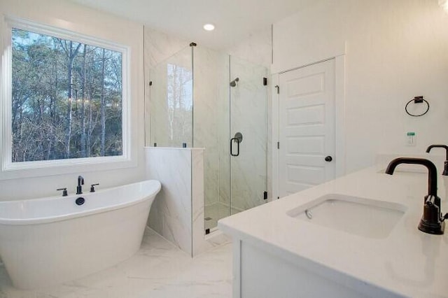 bathroom featuring vanity and plus walk in shower