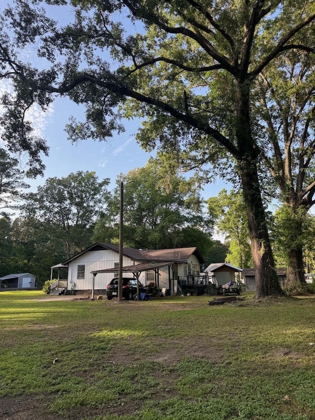 3637 Prices Bridge Ln, Walterboro, SC 29488 - view of green lawn featuring a carport