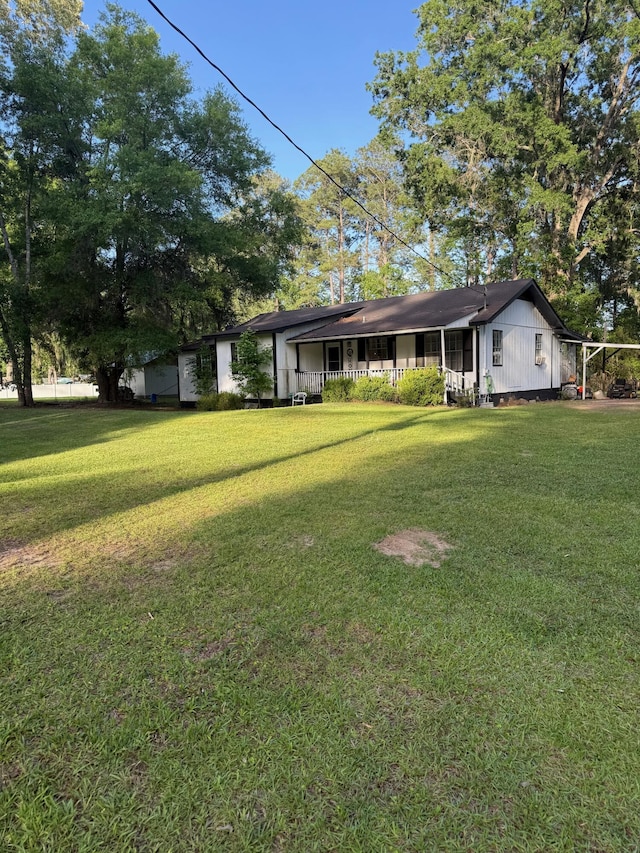 3637 Prices Bridge Ln, Walterboro, SC 29488 - view of grassy yard with a carport