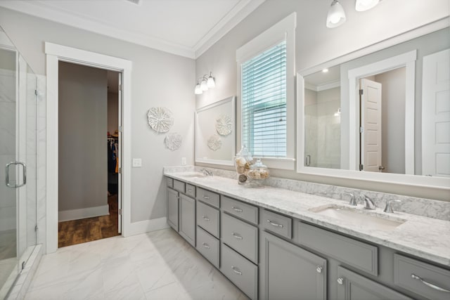 bathroom featuring walk in shower, vanity, and ornamental molding