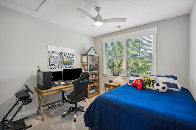 bedroom featuring ceiling fan and carpet floors