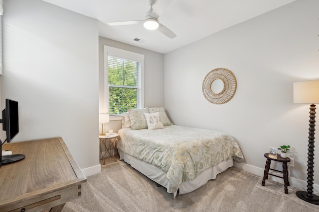 carpeted bedroom with ceiling fan