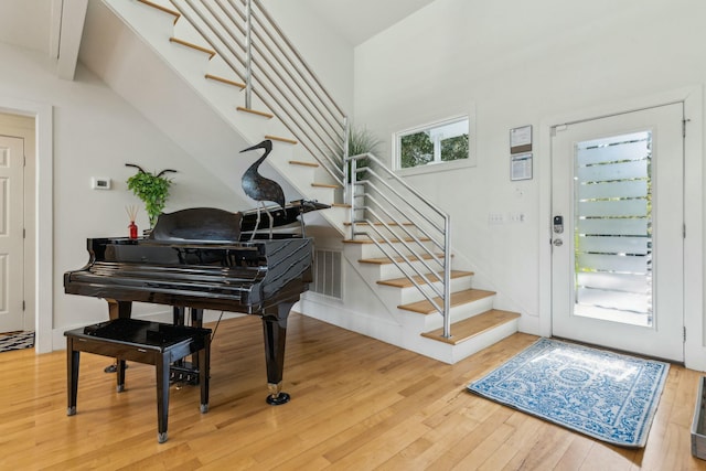 entrance foyer with hardwood / wood-style floors