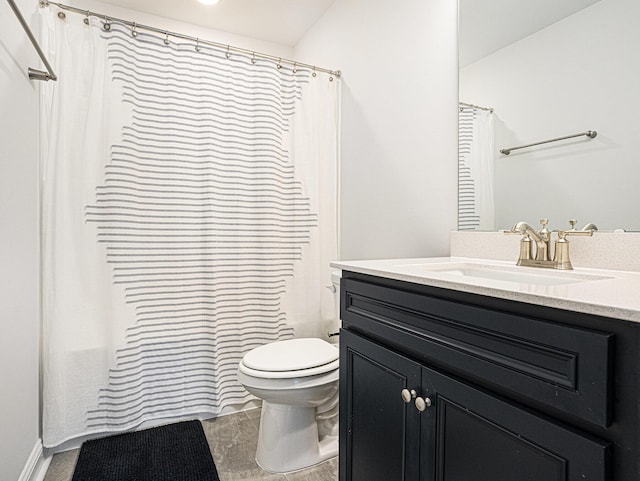 full bathroom with toilet and vanity