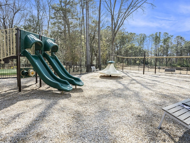 community jungle gym with fence