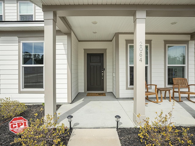 entrance to property with a porch