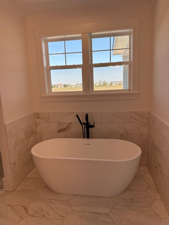 bathroom featuring tile flooring and tile walls