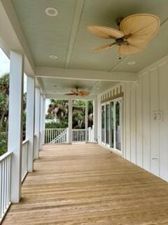 wooden terrace with ceiling fan