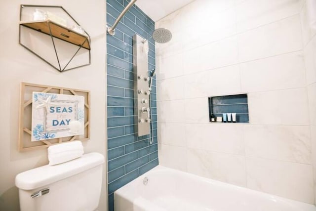 full bath featuring toilet and shower / tub combination
