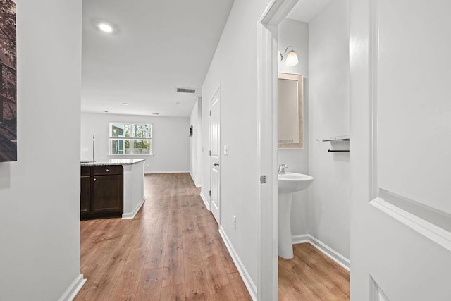 261 Celestial Blvd, Summerville, SC 29486 - corridor featuring light wood finished floors and baseboards