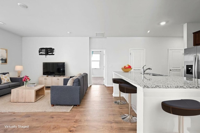 261 Celestial Blvd, Summerville, SC 29486 - living area featuring light wood-style flooring, baseboards, and recessed lighting
