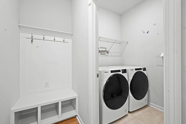 261 Celestial Blvd, Summerville, SC 29486 - laundry area featuring separate washer and dryer, light tile patterned floors, and baseboards