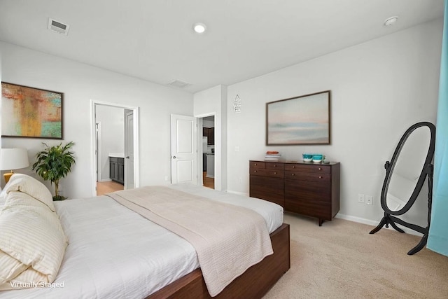 261 Celestial Blvd, Summerville, SC 29486 - bedroom with light carpet, baseboards, and ensuite bath