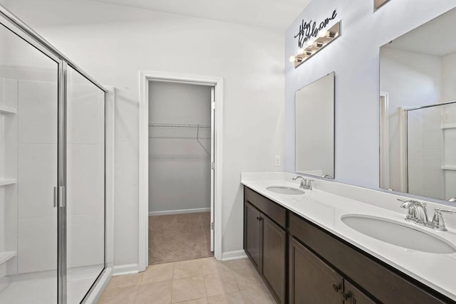 261 Celestial Blvd, Summerville, SC 29486 - full bath with a stall shower, a walk in closet, double vanity, and baseboards