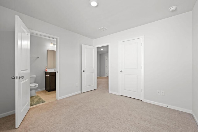261 Celestial Blvd, Summerville, SC 29486 - unfurnished bedroom with light carpet, baseboards, and connected bathroom