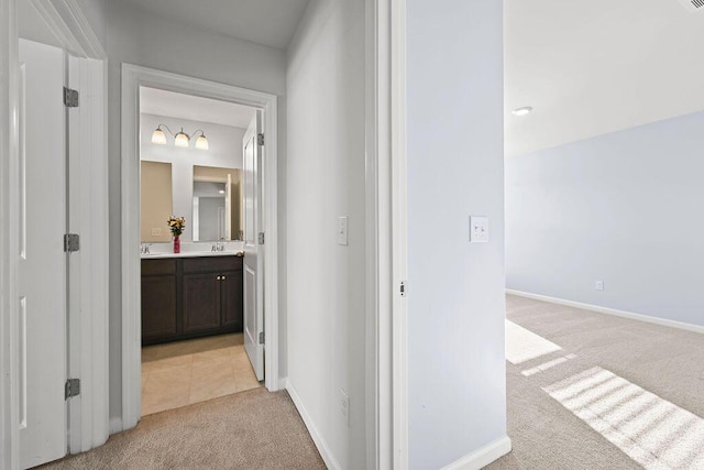 261 Celestial Blvd, Summerville, SC 29486 - hallway with light colored carpet and baseboards