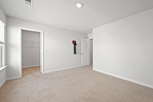 261 Celestial Blvd, Summerville, SC 29486 - unfurnished bedroom with carpet floors, a spacious closet, baseboards, and a closet