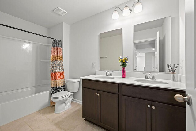 261 Celestial Blvd, Summerville, SC 29486 - bathroom with toilet, double vanity, tile patterned floors, shower / bath combo, and baseboards