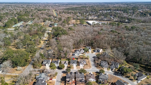 aerial view with a residential view and a wooded view