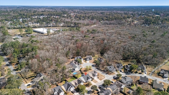 aerial view with a residential view and a wooded view