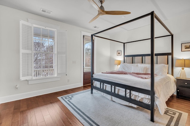 bedroom featuring dark wood-type flooring and ceiling fan