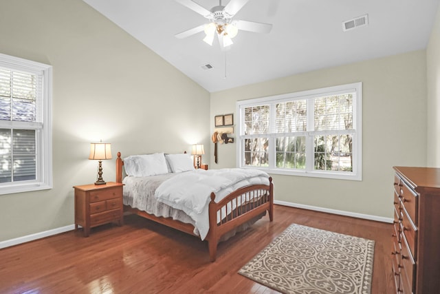2257 Magnolia Meadows Dr, Mount Pleasant, SC 29464 - bedroom with lofted ceiling, multiple windows, wood finished floors, and baseboards