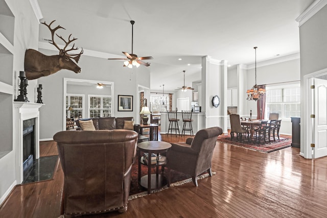 2257 Magnolia Meadows Dr, Mount Pleasant, SC 29464 - living area featuring ceiling fan, wood finished floors, a high end fireplace, ornamental molding, and recessed lighting