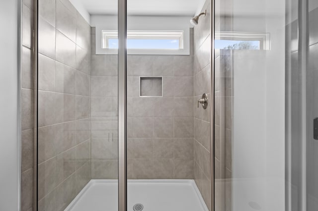 bathroom featuring an enclosed shower