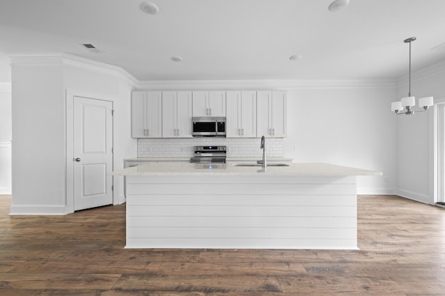 kitchen featuring stainless steel appliances, white cabinetry, dark hardwood / wood-style floors, and sink