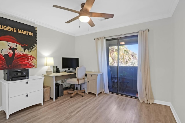 office featuring light wood-style flooring, baseboards, and ornamental molding