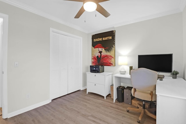 office space featuring crown molding, wood finished floors, and baseboards