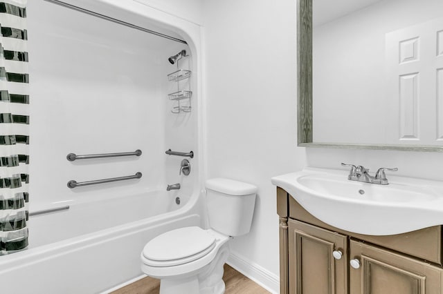 full bathroom featuring hardwood / wood-style flooring, vanity,  shower combination, and toilet