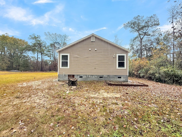 view of home's exterior featuring a lawn