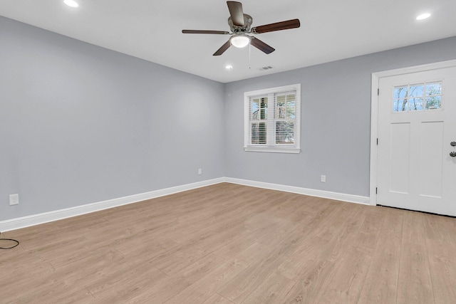 entrance foyer with ceiling fan and light hardwood / wood-style floors