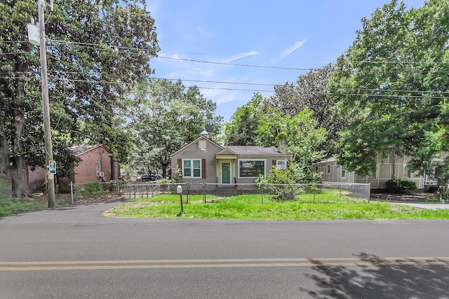 2665 Ranger Dr, North Charleston, SC 29405 - view of front of home with a fenced front yard and a chimney