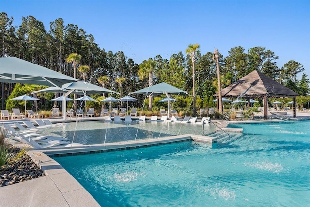 view of swimming pool featuring a gazebo