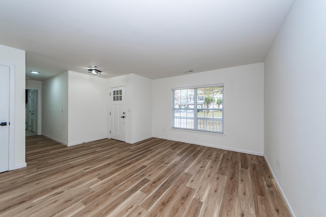 empty room featuring light hardwood / wood-style floors