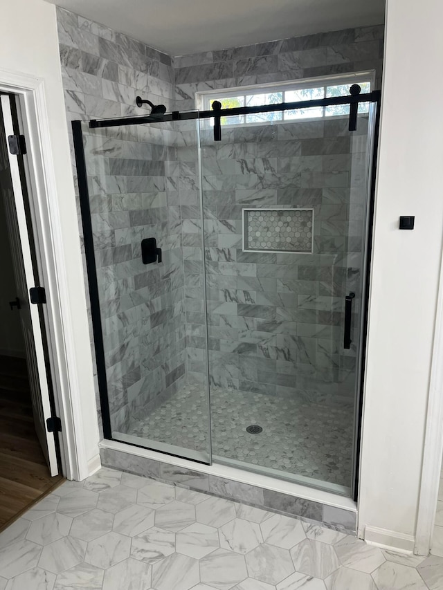 bathroom with an enclosed shower