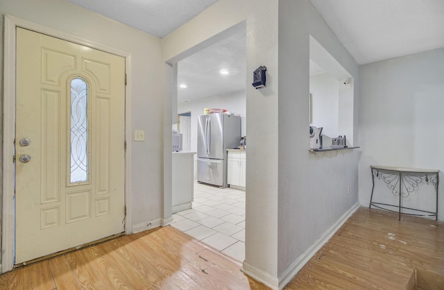 7074 W Constellation Dr, North Charleston, SC 29418 - entrance foyer featuring baseboards and light wood-style flooring